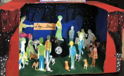imagen de una maqueta realizada con muñecas